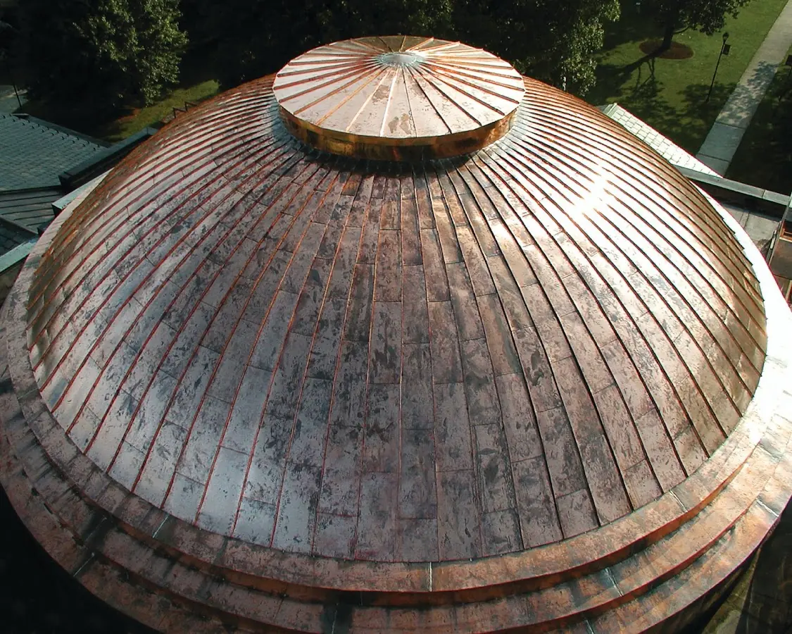 Craftsman Roofing crew installing a new roof in Gloria Dei Towers